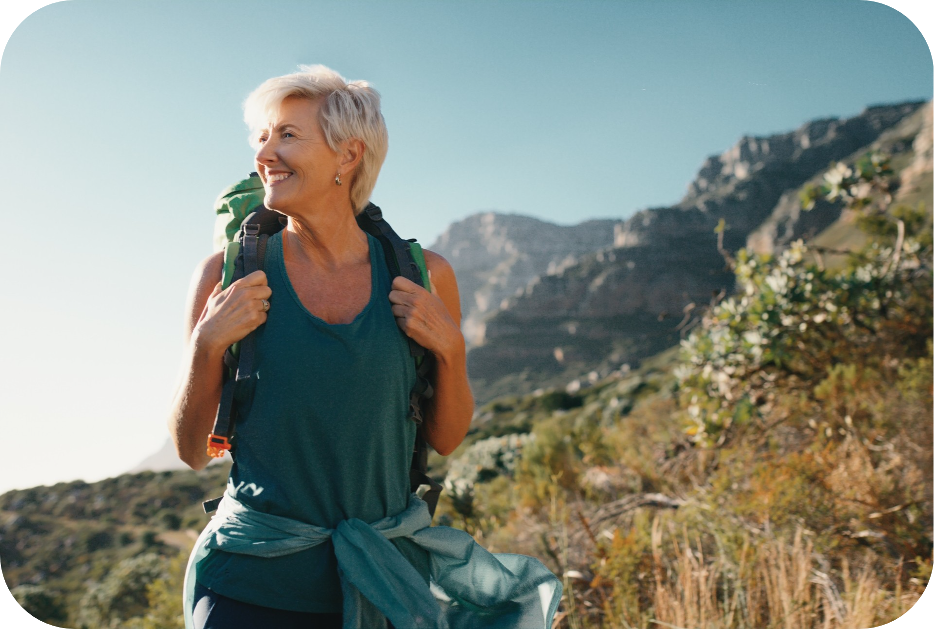 Active - Hiker with backpack and teal tank top-modified (1)