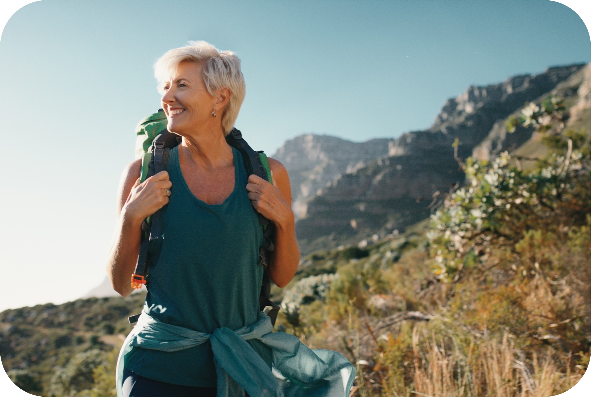 Active - Hiker with backpack and teal tank top-modified (1)